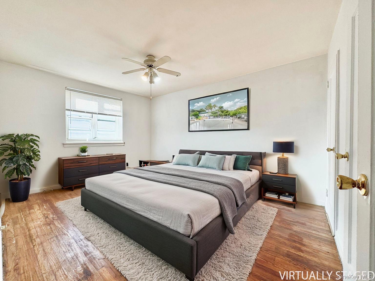 35-40 Clearview Expressway, Unit 371 Queens, NY 11361 - Photo 6 of 10 a bedroom with bed and a window