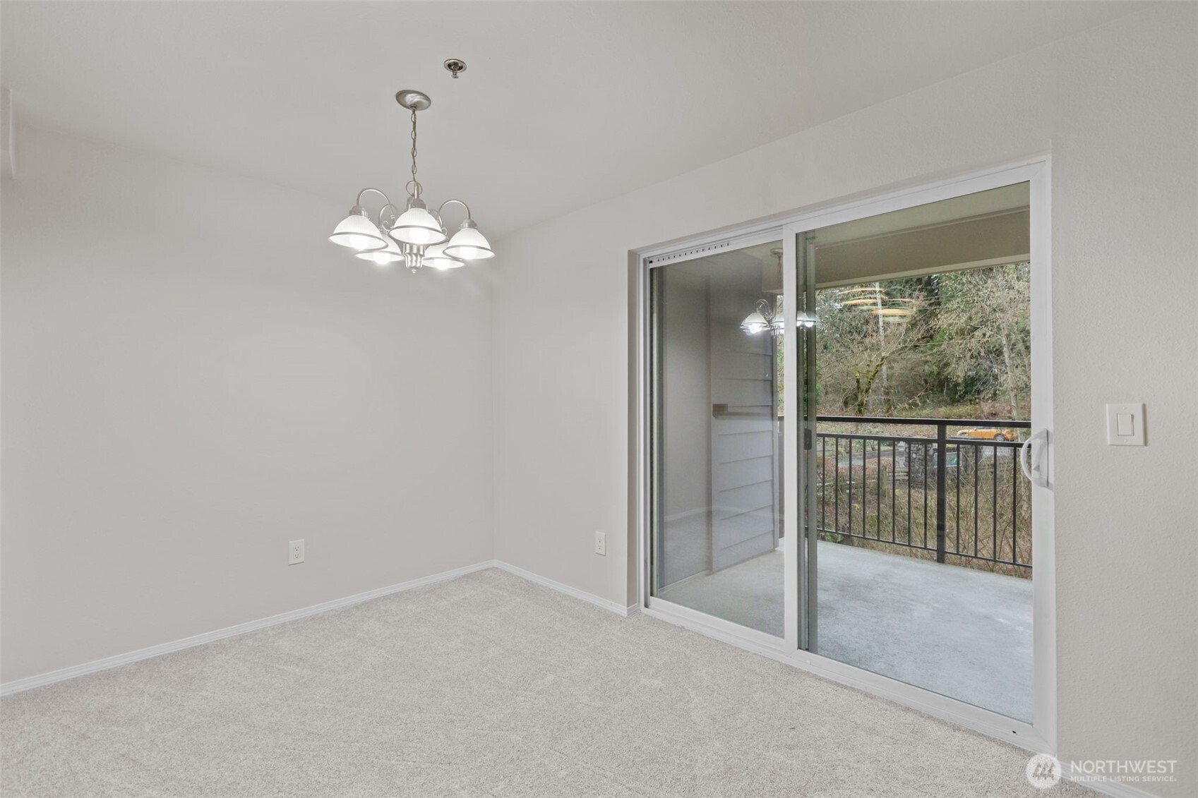 19404 Bothell Way Northeast, Unit B202 Bothell, WA 98011 - Photo 11 of 38 a view of a chandelier in big room and chandelier