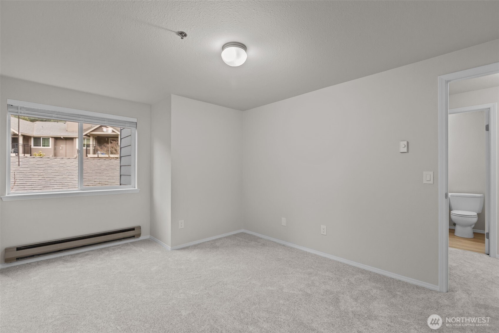 19404 Bothell Way Northeast, Unit B202 Bothell, WA 98011 - Photo 21 of 38 a view of an empty room