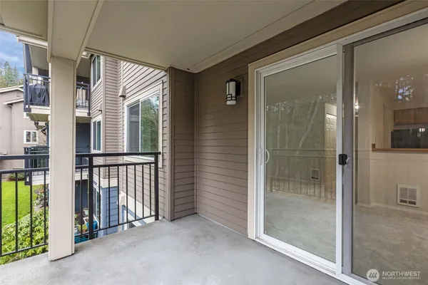 a view of a bathroom with a glass door