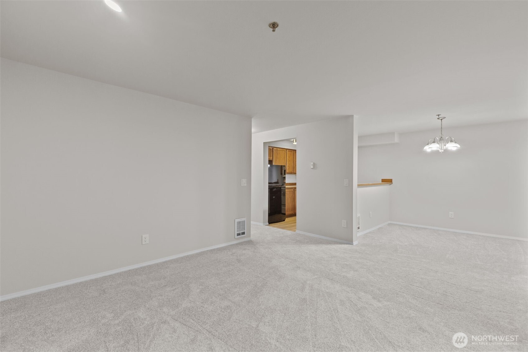 19404 Bothell Way Northeast, Unit B202 Bothell, WA 98011 - Photo 8 of 38 an empty room with an entryway