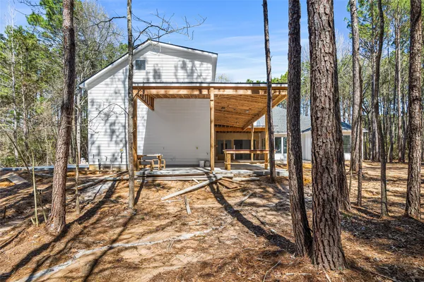 a house with trees in front of it