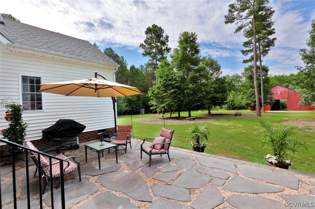 16221 Beach Road Chesterfield, VA 23838 - Photo 34 of 48 a view of a chair and table on the garden