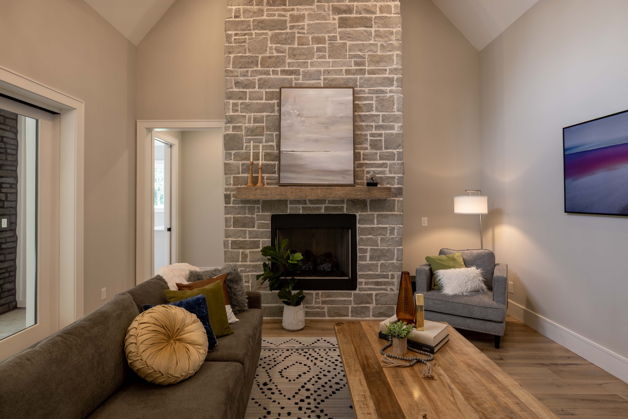 1442 Coleman Road Franklin, TN 37064 - Photo 12 of 63 a living room with furniture and a fireplace