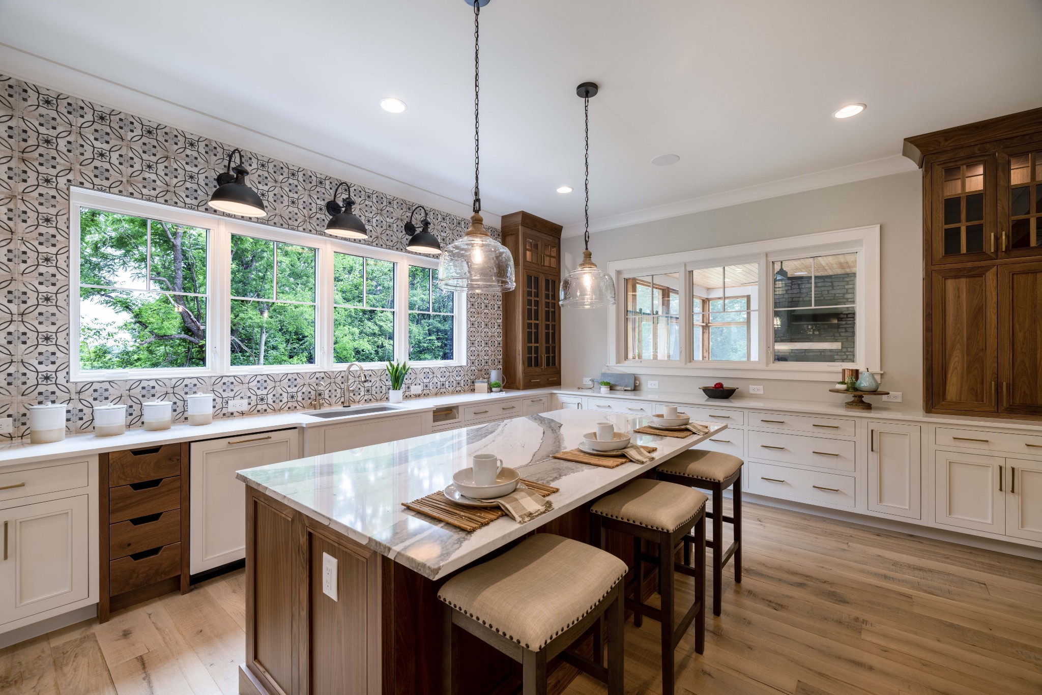 1442 Coleman Road Franklin, TN 37064 - Photo 17 of 63 a kitchen with stainless steel appliances granite countertop a table chairs stove and refrigerator