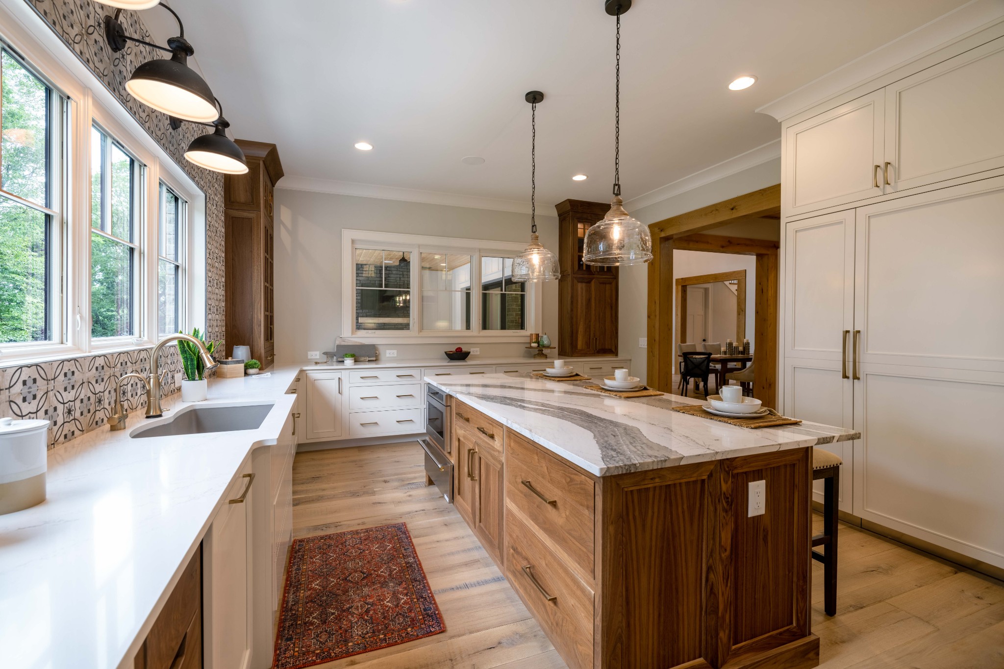 1442 Coleman Road Franklin, TN 37064 - Photo 18 of 63 a large kitchen with kitchen island a large island in it