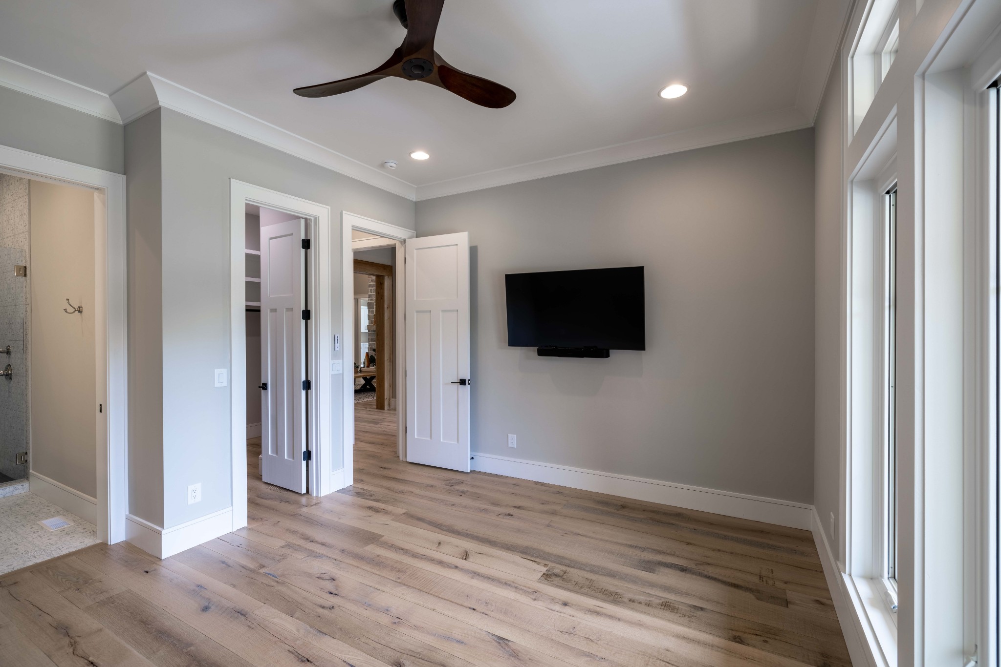 1442 Coleman Road Franklin, TN 37064 - Photo 23 of 63 a view of hallway with wooden floor and flat screen tv