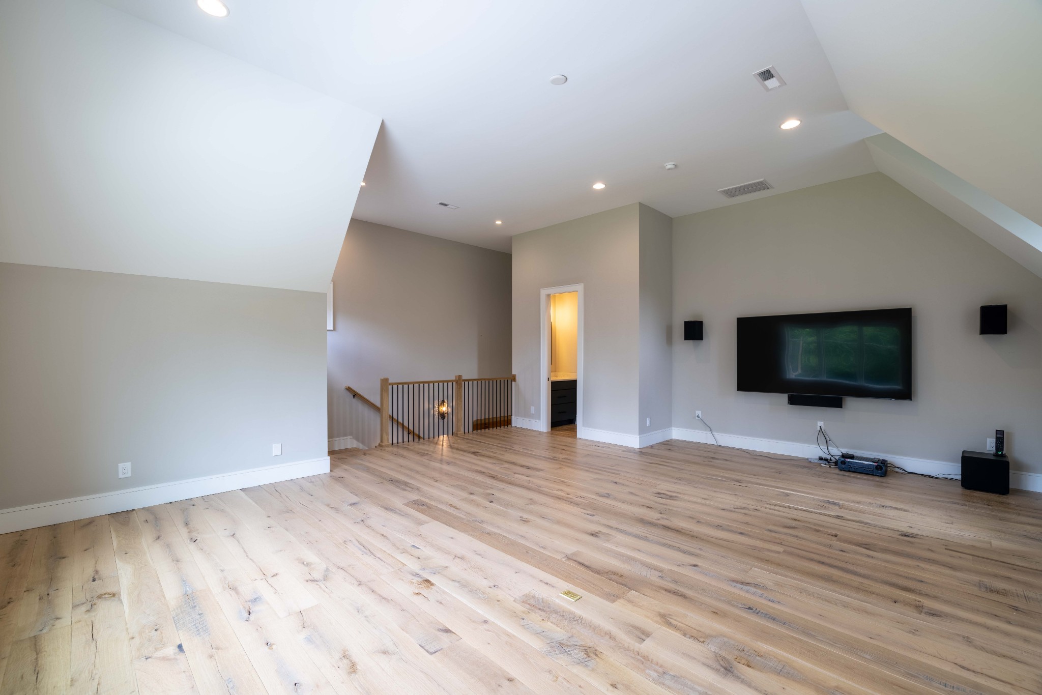 1442 Coleman Road Franklin, TN 37064 - Photo 40 of 63 a view of a livingroom with wooden floor and a flat screen tv