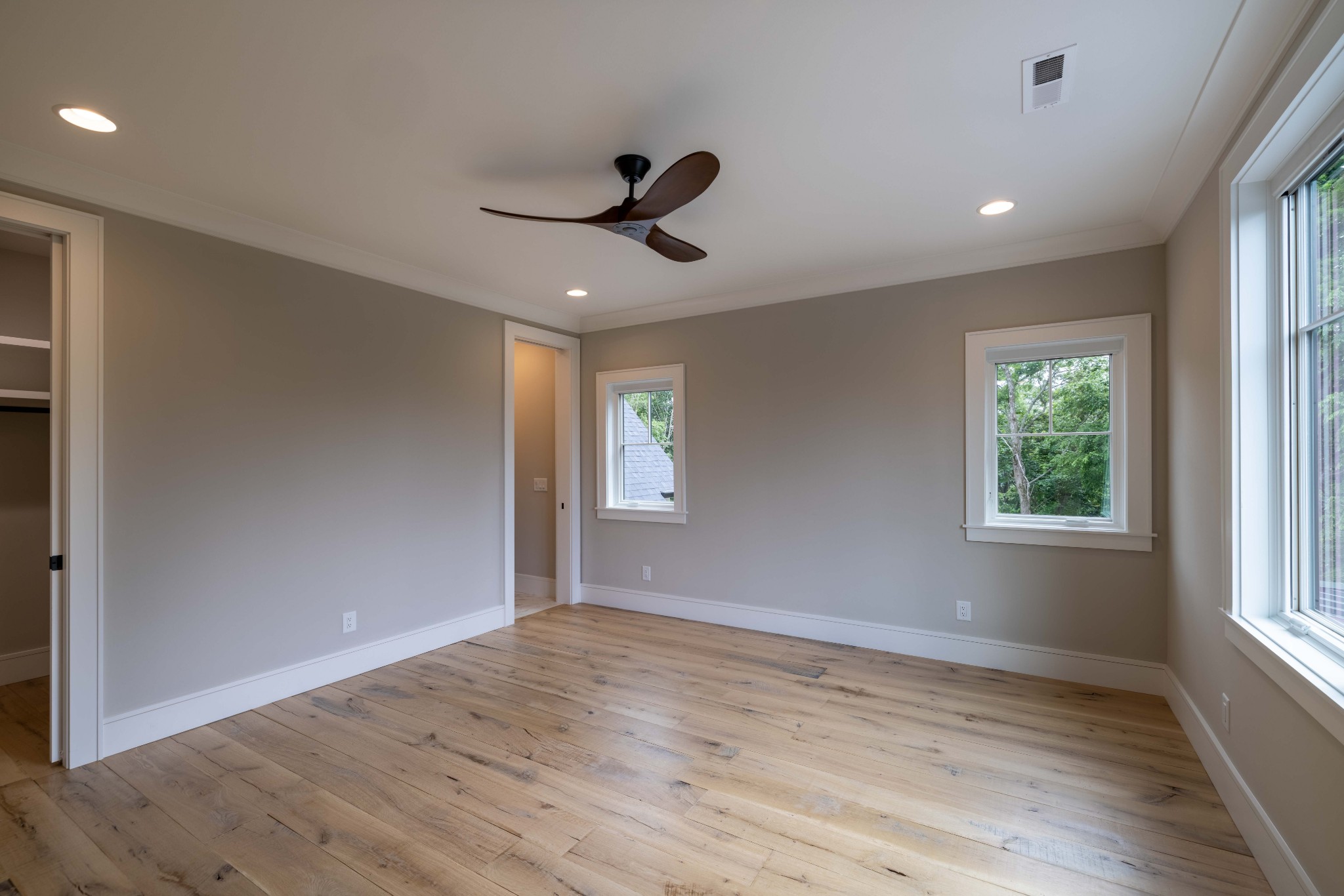 1442 Coleman Road Franklin, TN 37064 - Photo 47 of 63 an empty room with wooden floor fan and windows