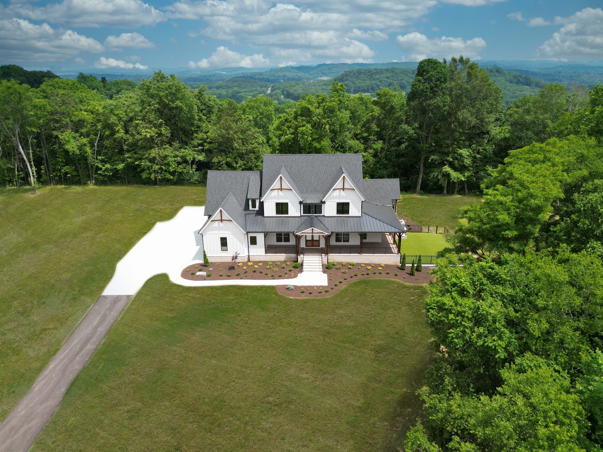 1442 Coleman Road Franklin, TN 37064 - Photo 58 of 63 a view of a house with a yard