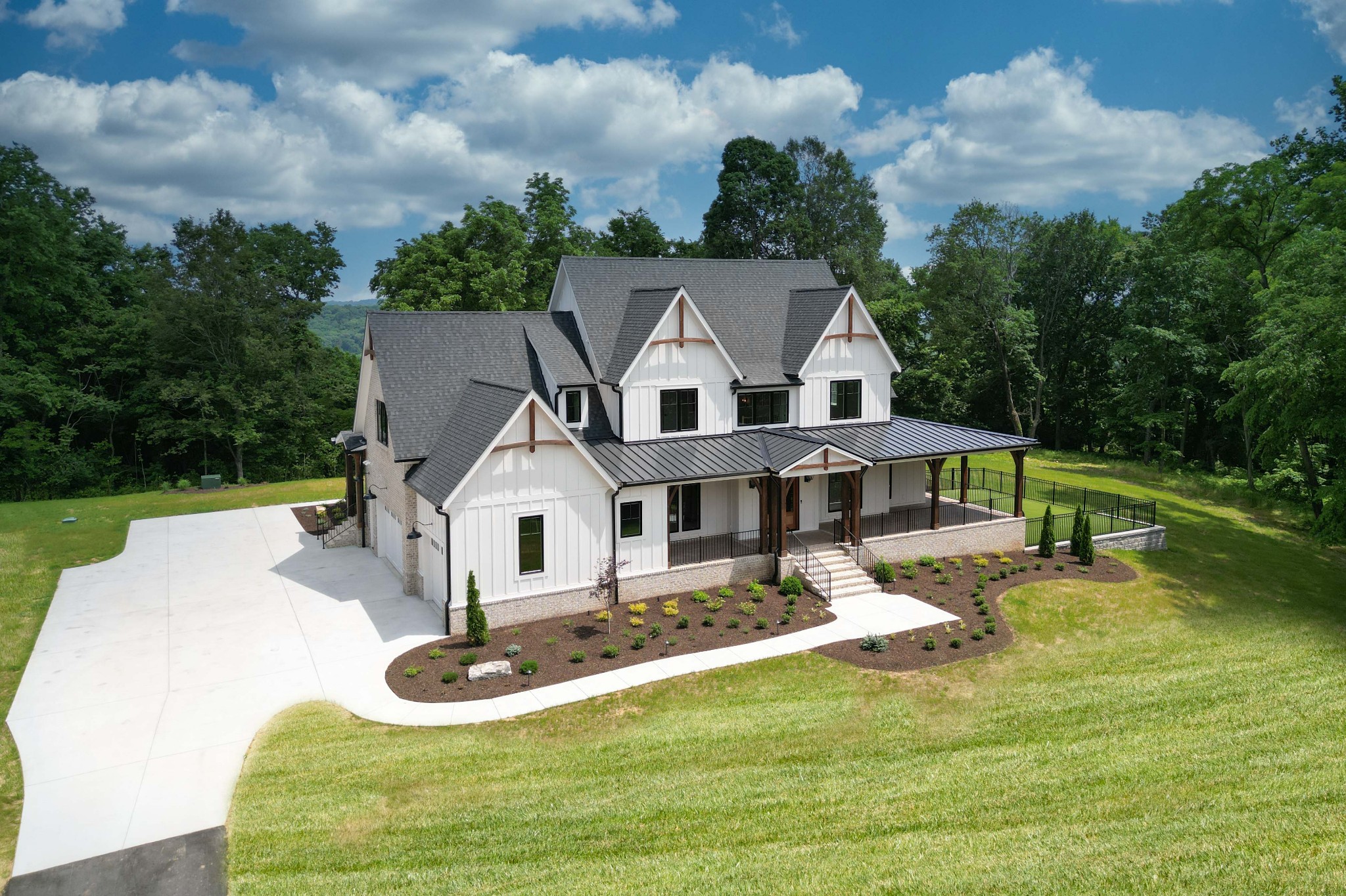 1442 Coleman Road Franklin, TN 37064 - Photo 61 of 63 a front view of house with yard and trees in the background