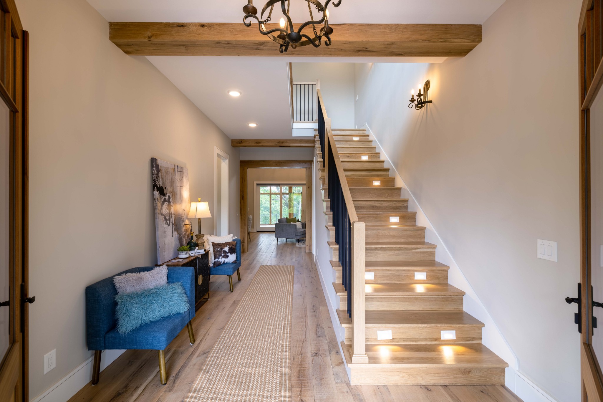 1442 Coleman Road Franklin, TN 37064 - Photo 7 of 63 a view of a hallway with furniture and a chandelier
