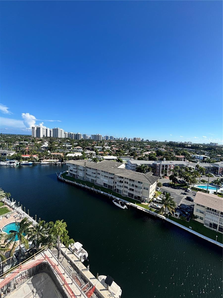 427 Golden Isles Drive, Unit 12B Hallandale Beach, FL 33009 - Photo 7 of 10 a view of a lake with a city