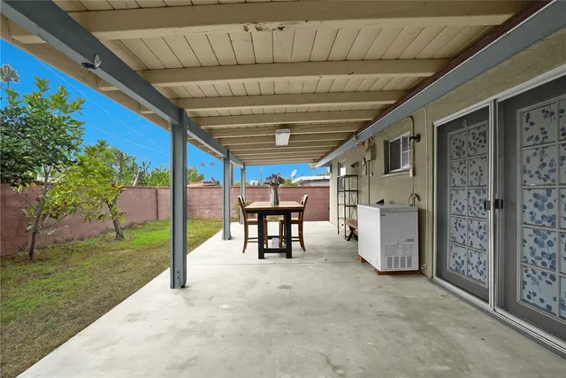 a view of a porch with furniture
