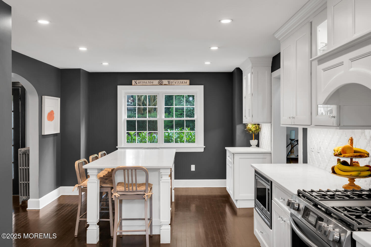 21 Buttonwood Drive Shrewsbury, NJ 07702 - Photo 15 of 86 a kitchen with a table chairs stove and cabinets