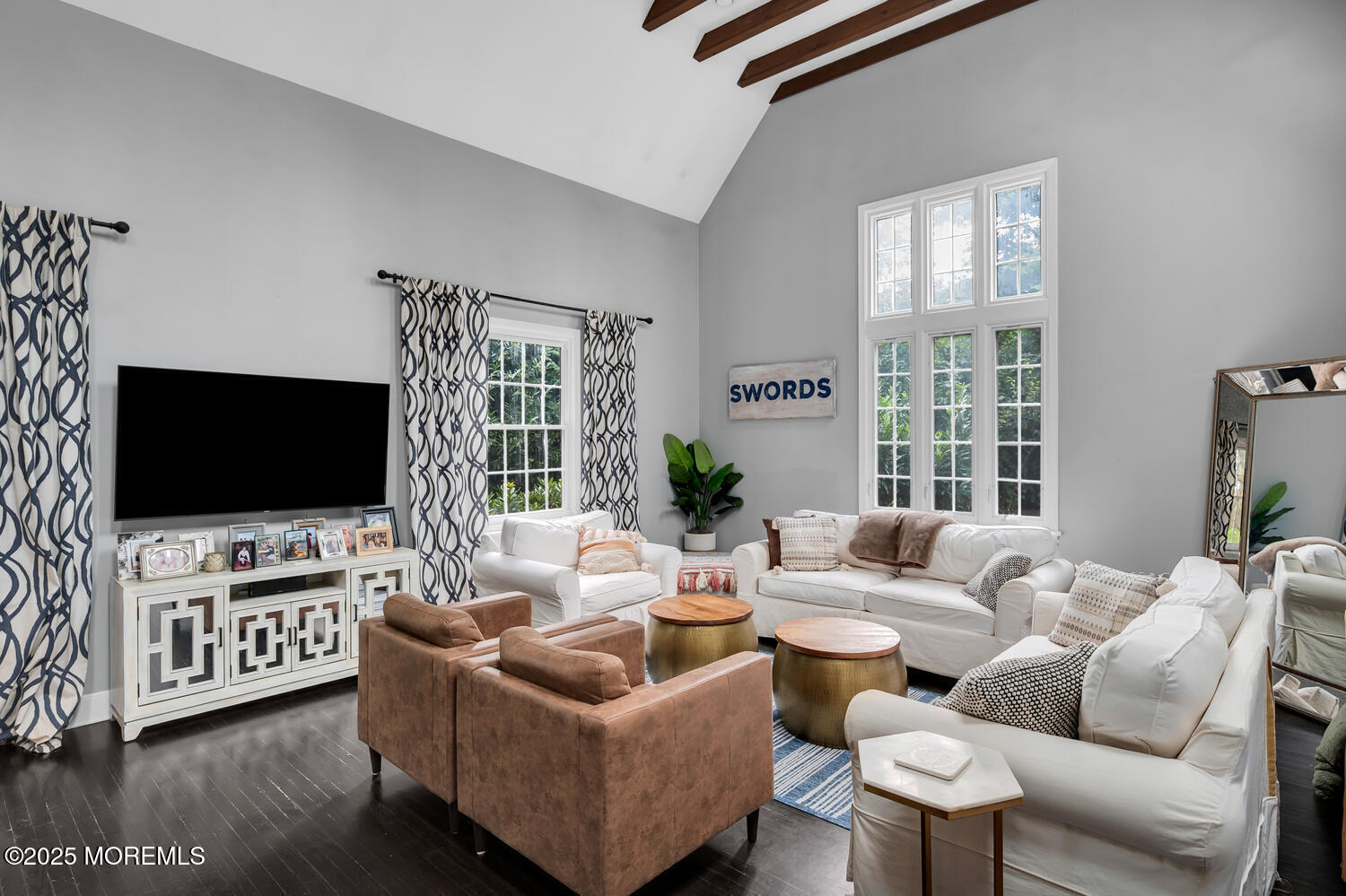 21 Buttonwood Drive Shrewsbury, NJ 07702 - Photo 32 of 86 a living room with furniture and a flat screen tv