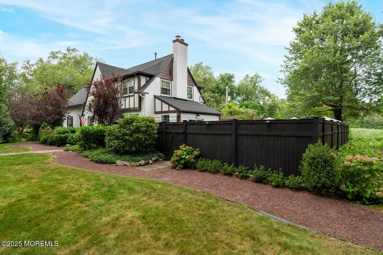 21 Buttonwood Drive Shrewsbury, NJ 07702 - Photo 4 of 86 a front view of a house having yard