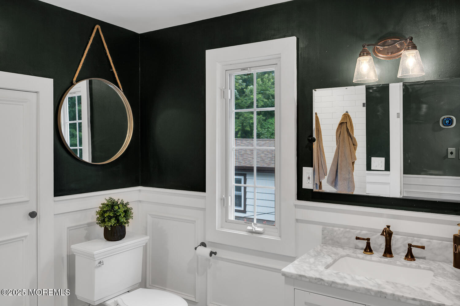 21 Buttonwood Drive Shrewsbury, NJ 07702 - Photo 51 of 86 a bathroom with a sink vanity mirror and toilet