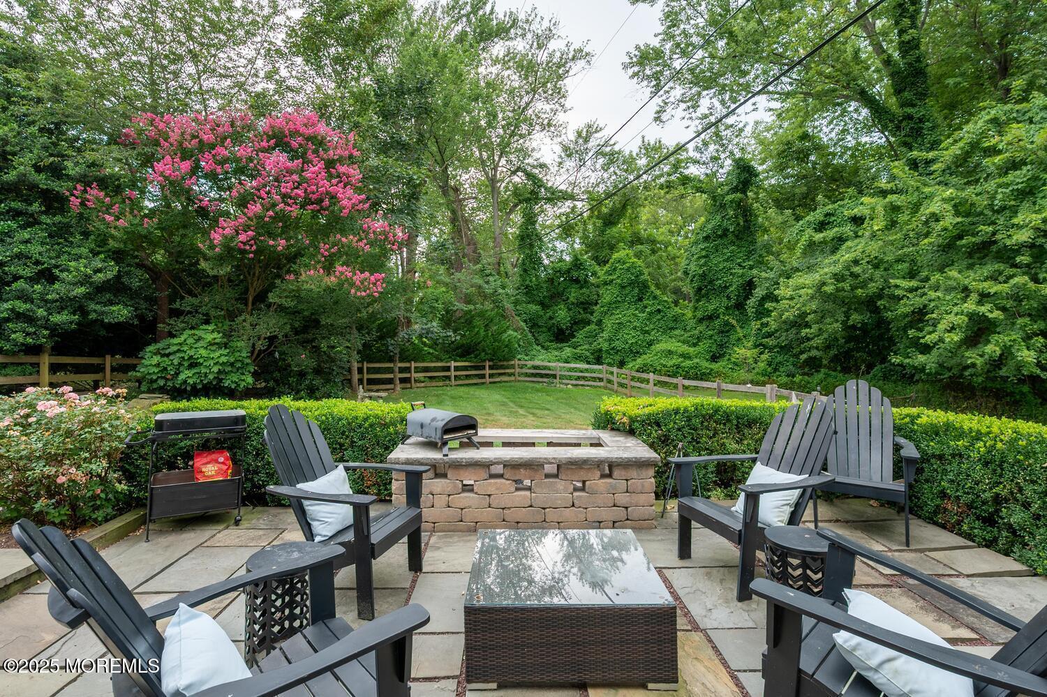 21 Buttonwood Drive Shrewsbury, NJ 07702 - Photo 58 of 86 a view of backyard with seating area and green space
