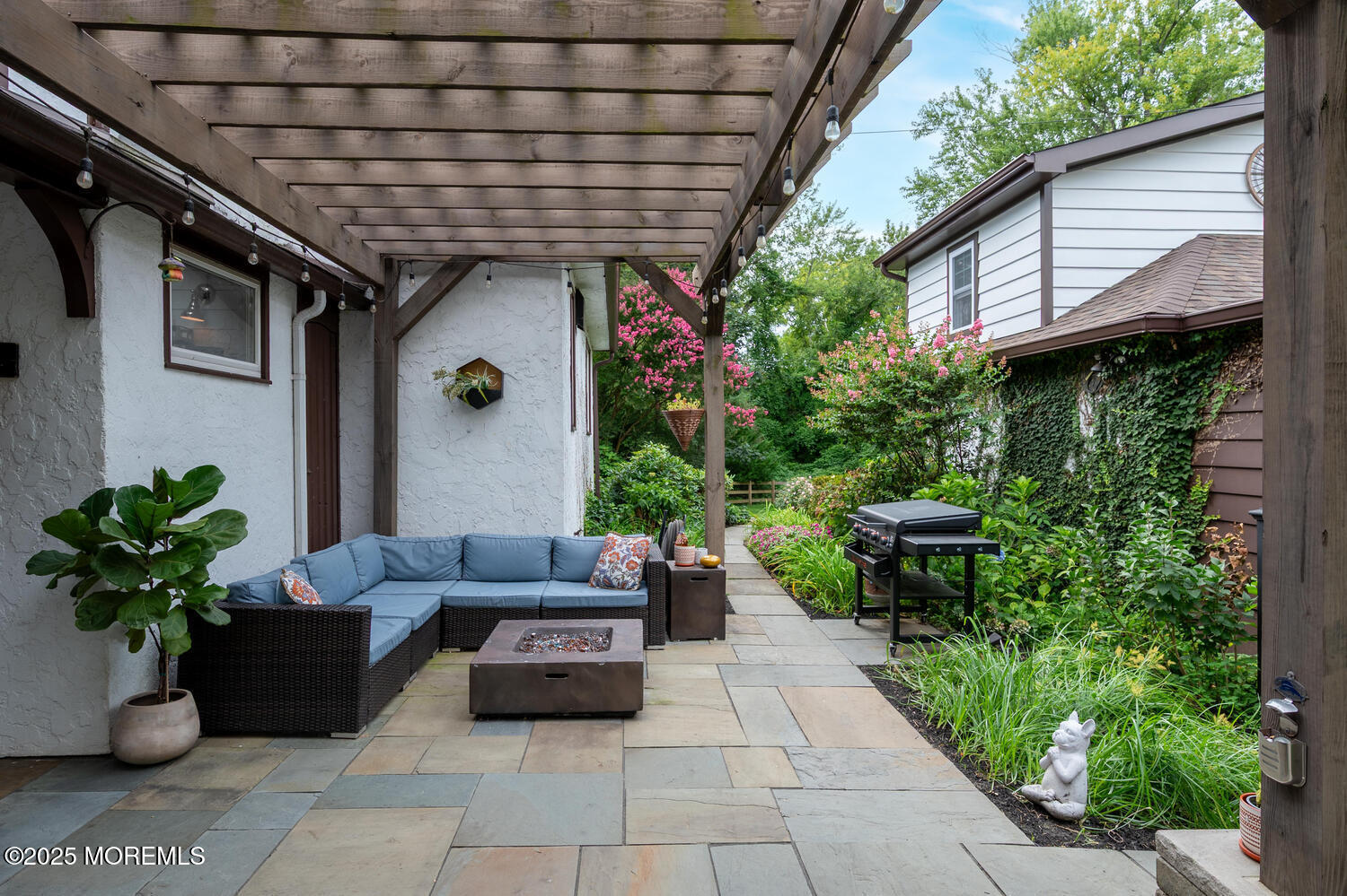 21 Buttonwood Drive Shrewsbury, NJ 07702 - Photo 62 of 86 a view of a porch with furniture and a potted plant