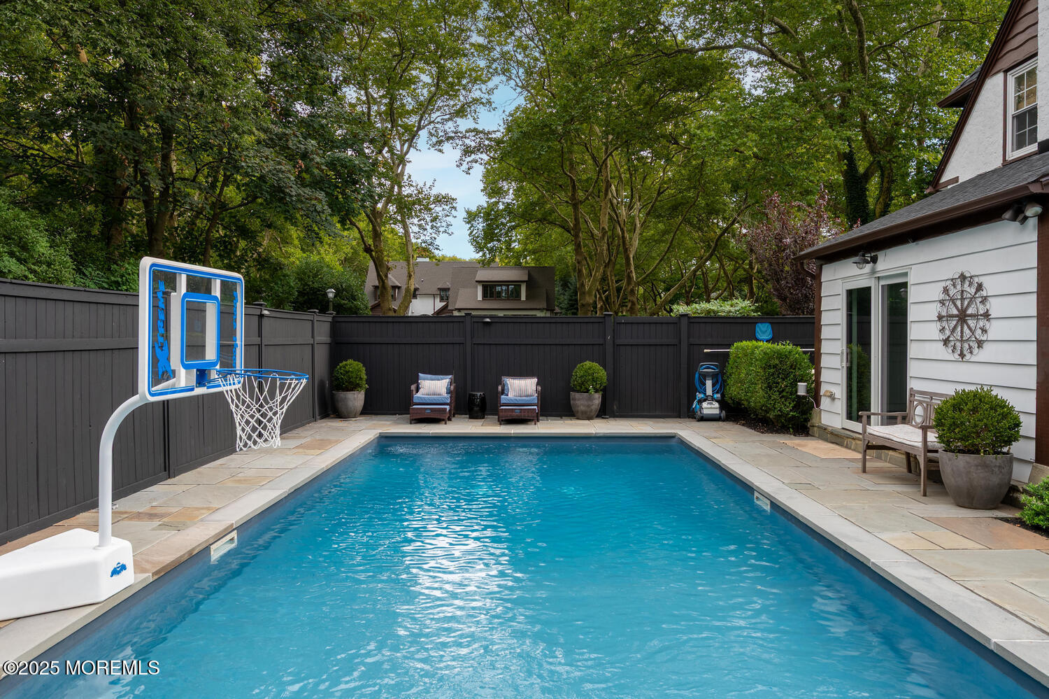 21 Buttonwood Drive Shrewsbury, NJ 07702 - Photo 63 of 86 a view of a balcony with chairs and a table