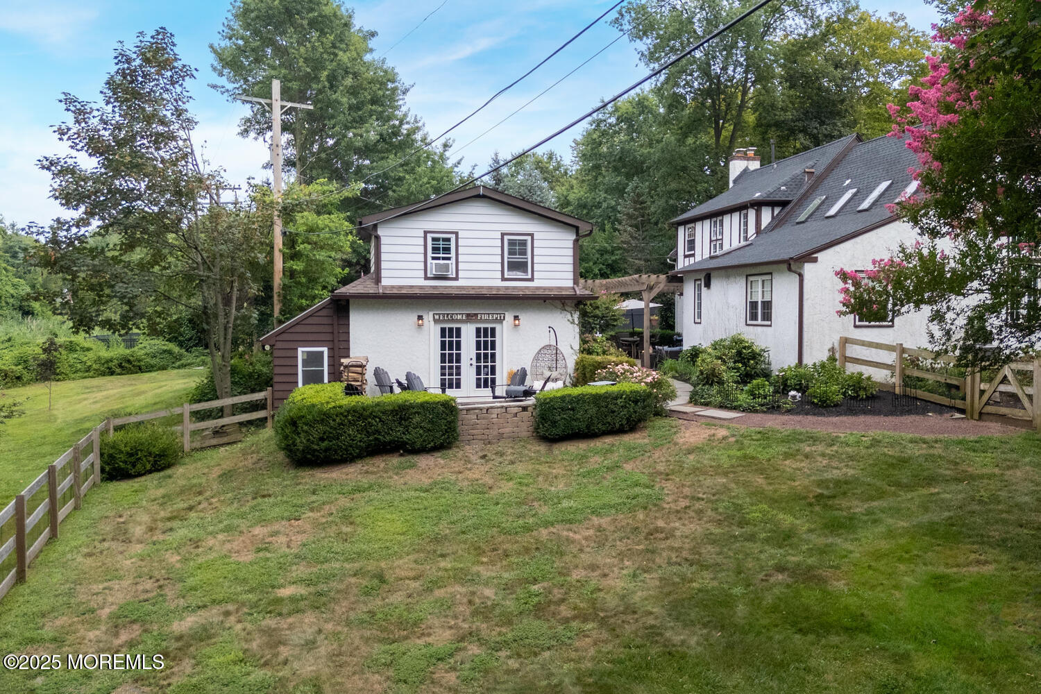 21 Buttonwood Drive Shrewsbury, NJ 07702 - Photo 76 of 86 a view of a house with a yard and sitting area