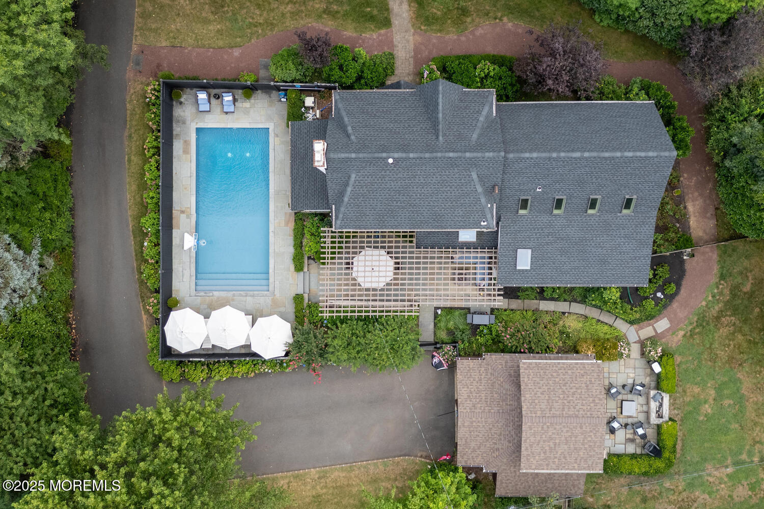 21 Buttonwood Drive Shrewsbury, NJ 07702 - Photo 77 of 86 an aerial view of a house with a yard and garden