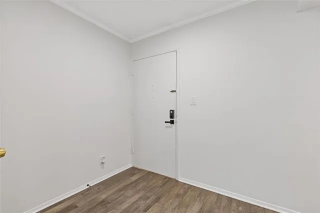 a view of small space with wooden floor