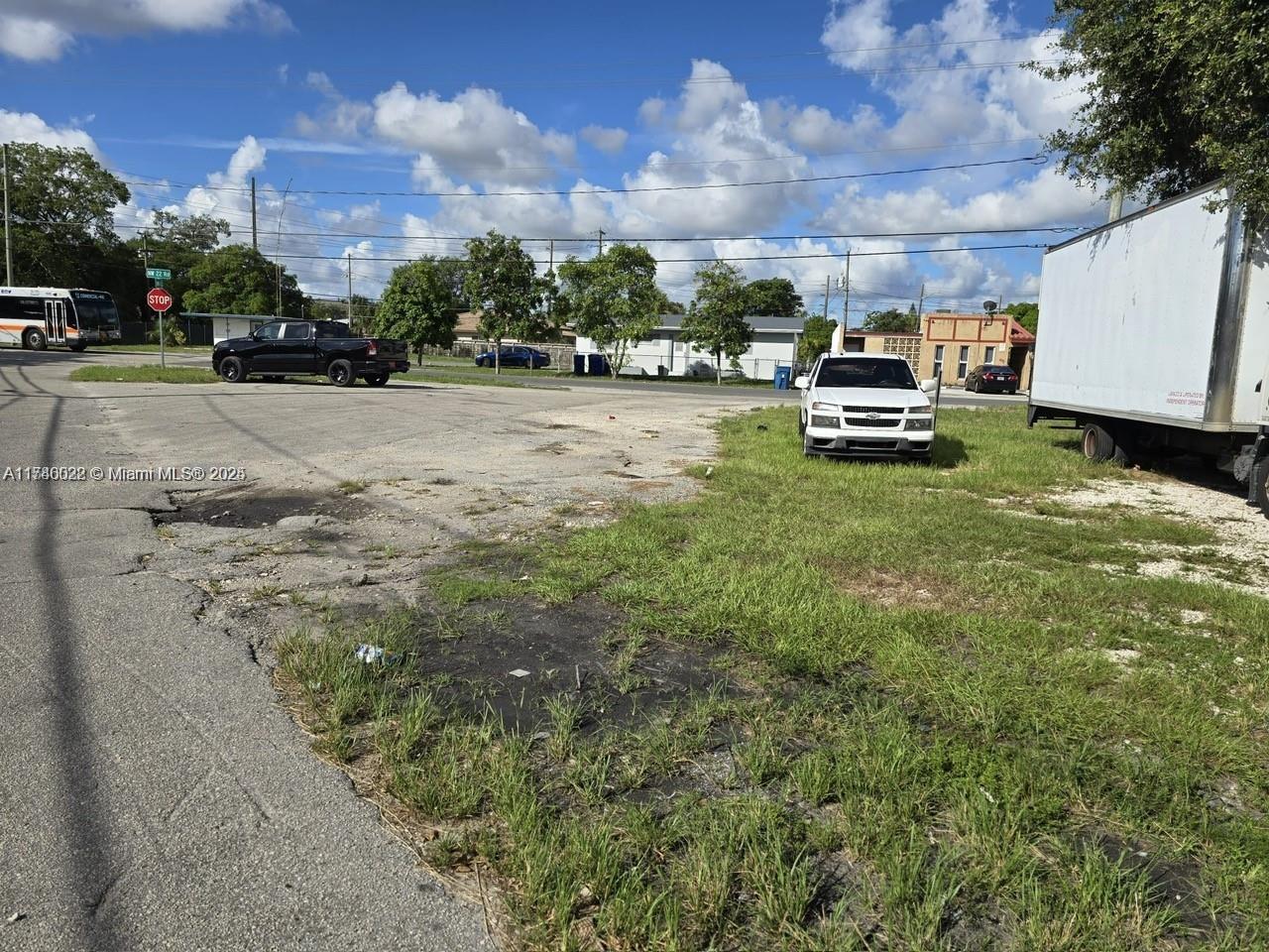 628 Northwest 22nd Road Fort Lauderdale, FL 33311 - Photo 6 of 8 a view of a yard with cars parked