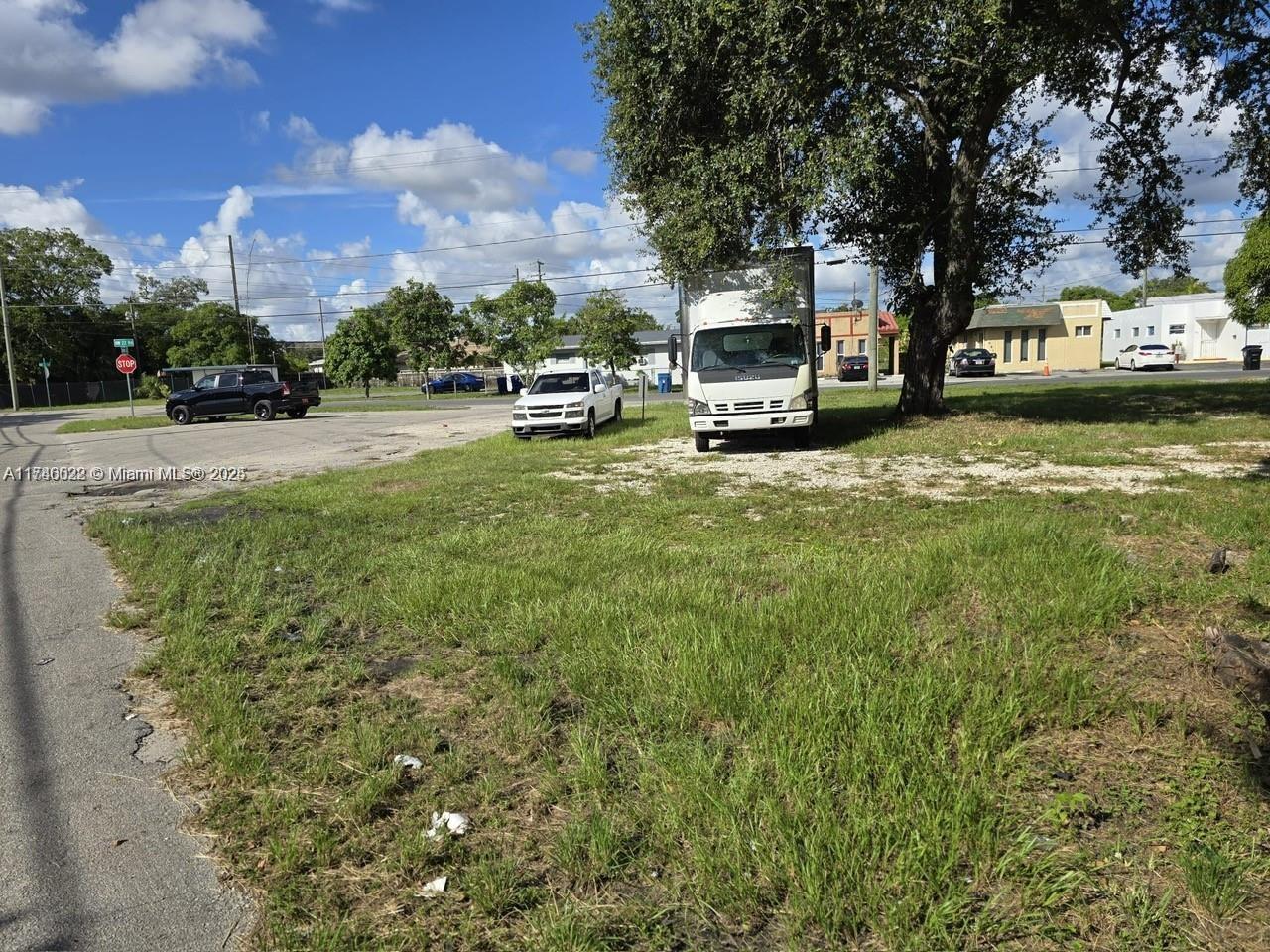 628 Northwest 22nd Road Fort Lauderdale, FL 33311 - Photo 8 of 8 a view of street with parked cars