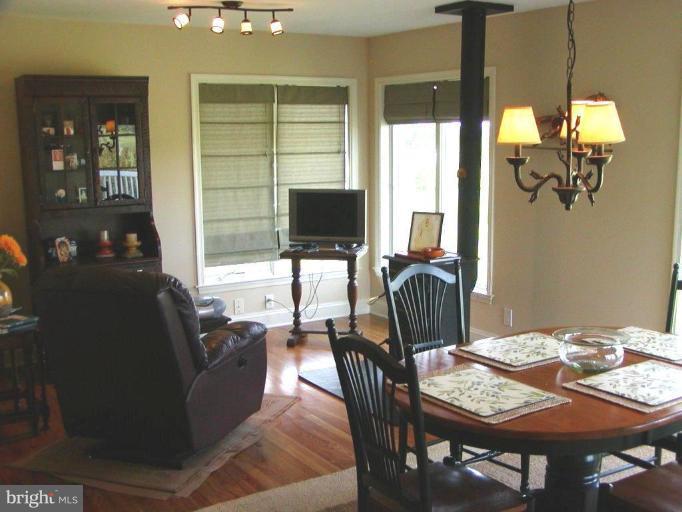 3897 Apple Pie Ridge Road Winchester, VA 22603 - Photo 6 of 10 a view of a livingroom with furniture and window