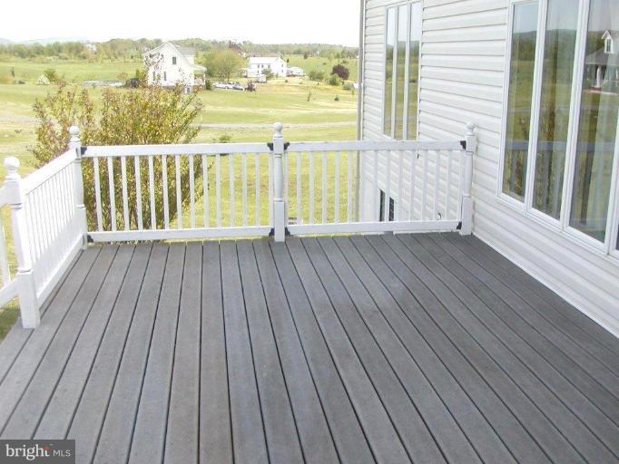 3897 Apple Pie Ridge Road Winchester, VA 22603 - Photo 7 of 10 a view of balcony with wooden floor