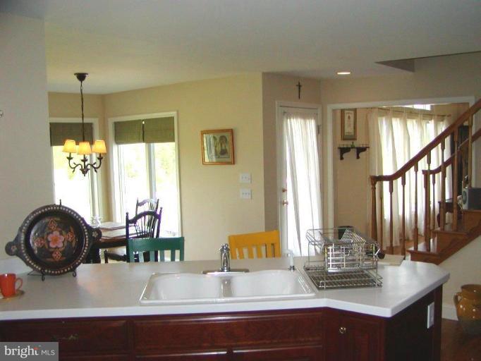 3897 Apple Pie Ridge Road Winchester, VA 22603 - Photo 8 of 10 a bathroom with a double vanity sink and a mirror