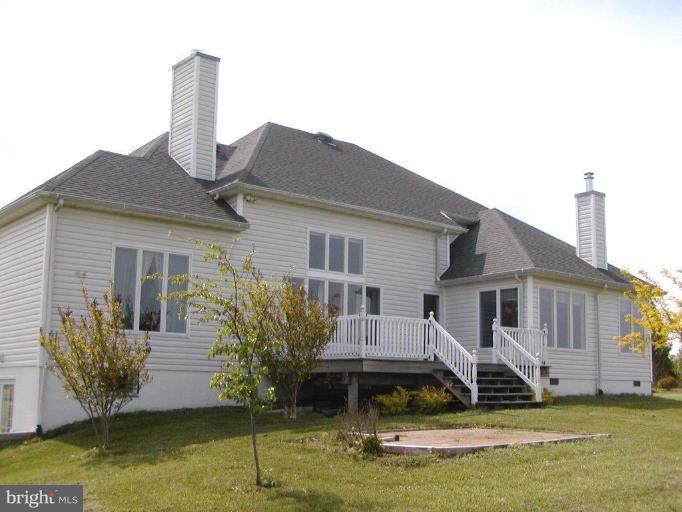 3897 Apple Pie Ridge Road Winchester, VA 22603 - Photo 10 of 10 a front view of a house with a yard