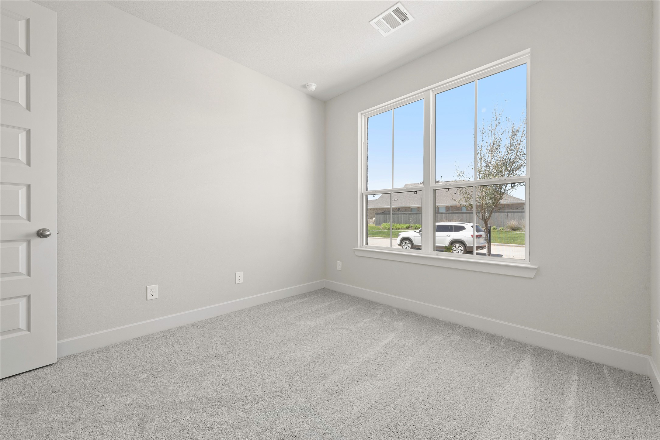4403 Ruby Gdn Court Fulshear, TX 77441 - Photo 12 of 28 a view of an empty room with a window