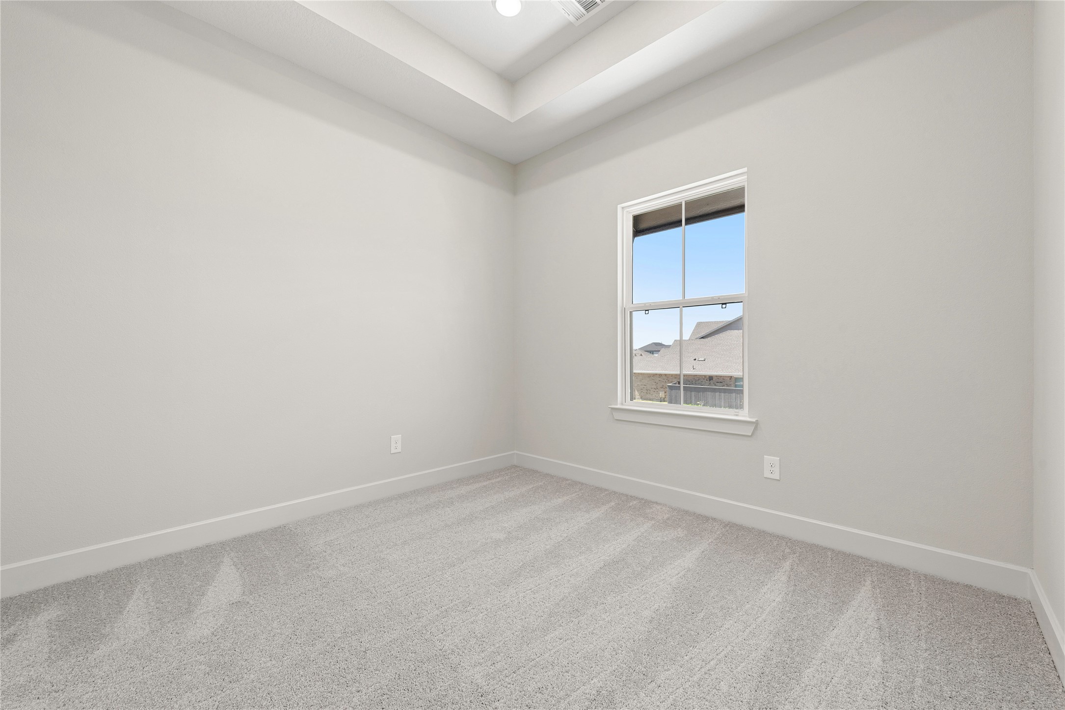 4403 Ruby Gdn Court Fulshear, TX 77441 - Photo 18 of 28 a view of an empty room with a window