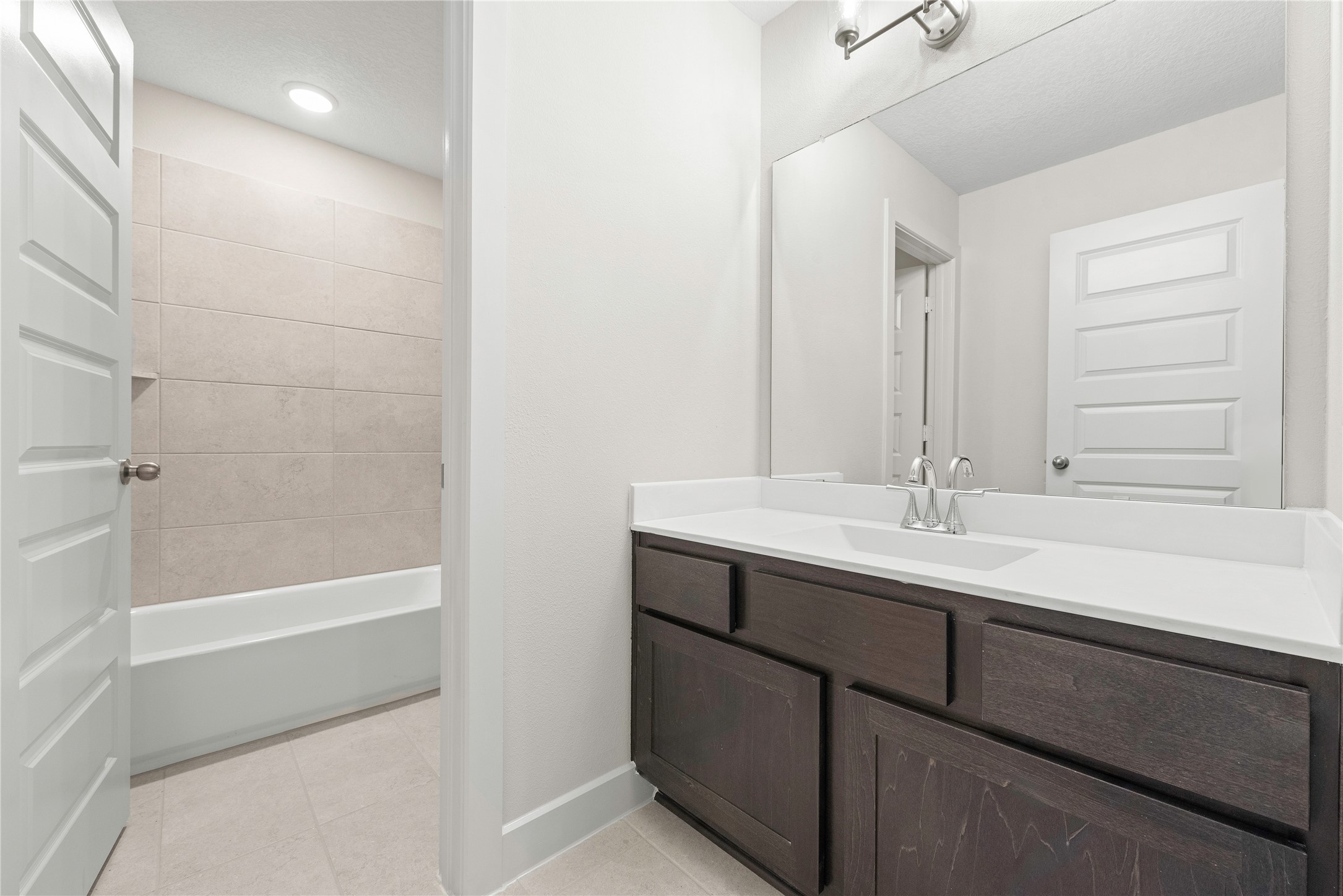 4403 Ruby Gdn Court Fulshear, TX 77441 - Photo 19 of 28 a bathroom with a sink and a bathtub