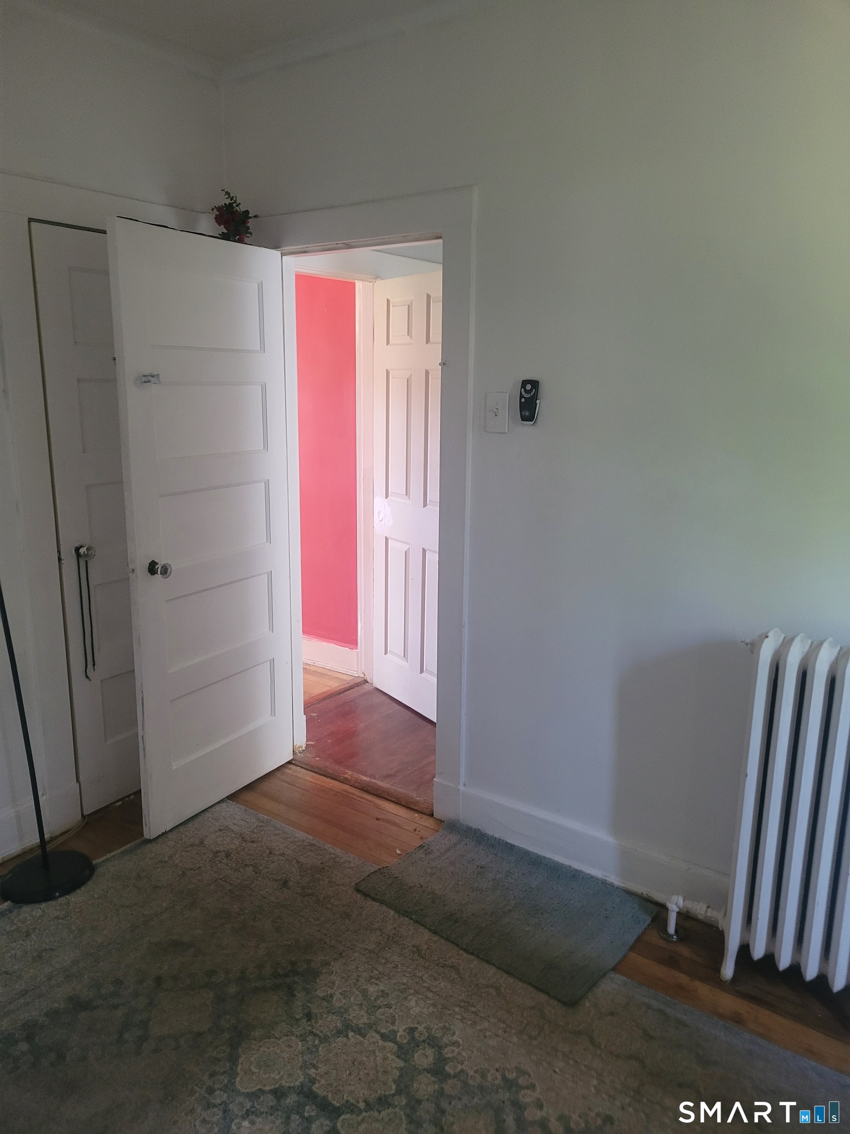 606 Wilmot Avenue, Unit 4 Bridgeport, CT 06607 - Photo 11 of 16 a view of entryway with wooden floor