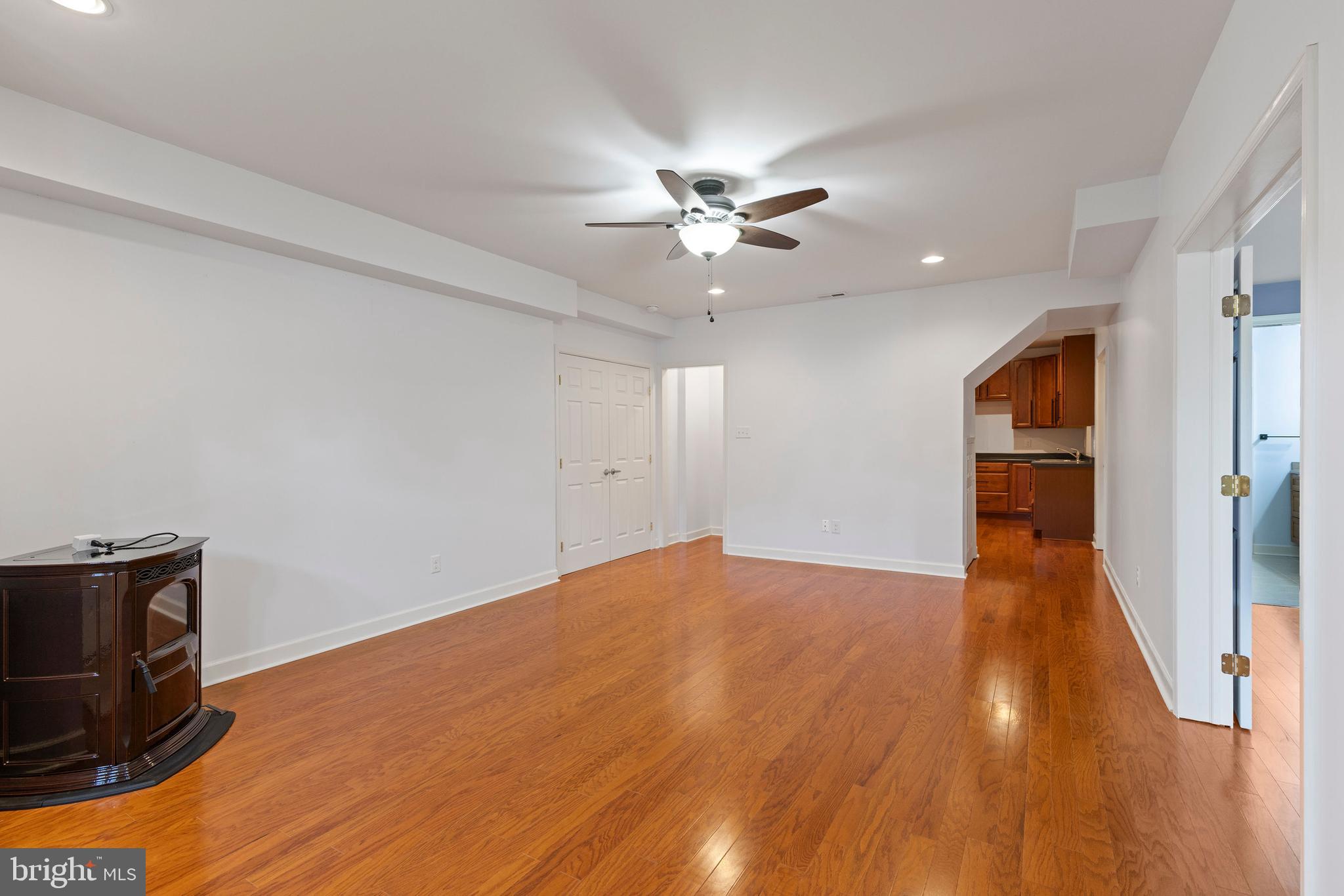 67 Merry Knoll Court Conowingo, MD 21918 - Photo 28 of 50 a view of empty room with wooden floor and fan
