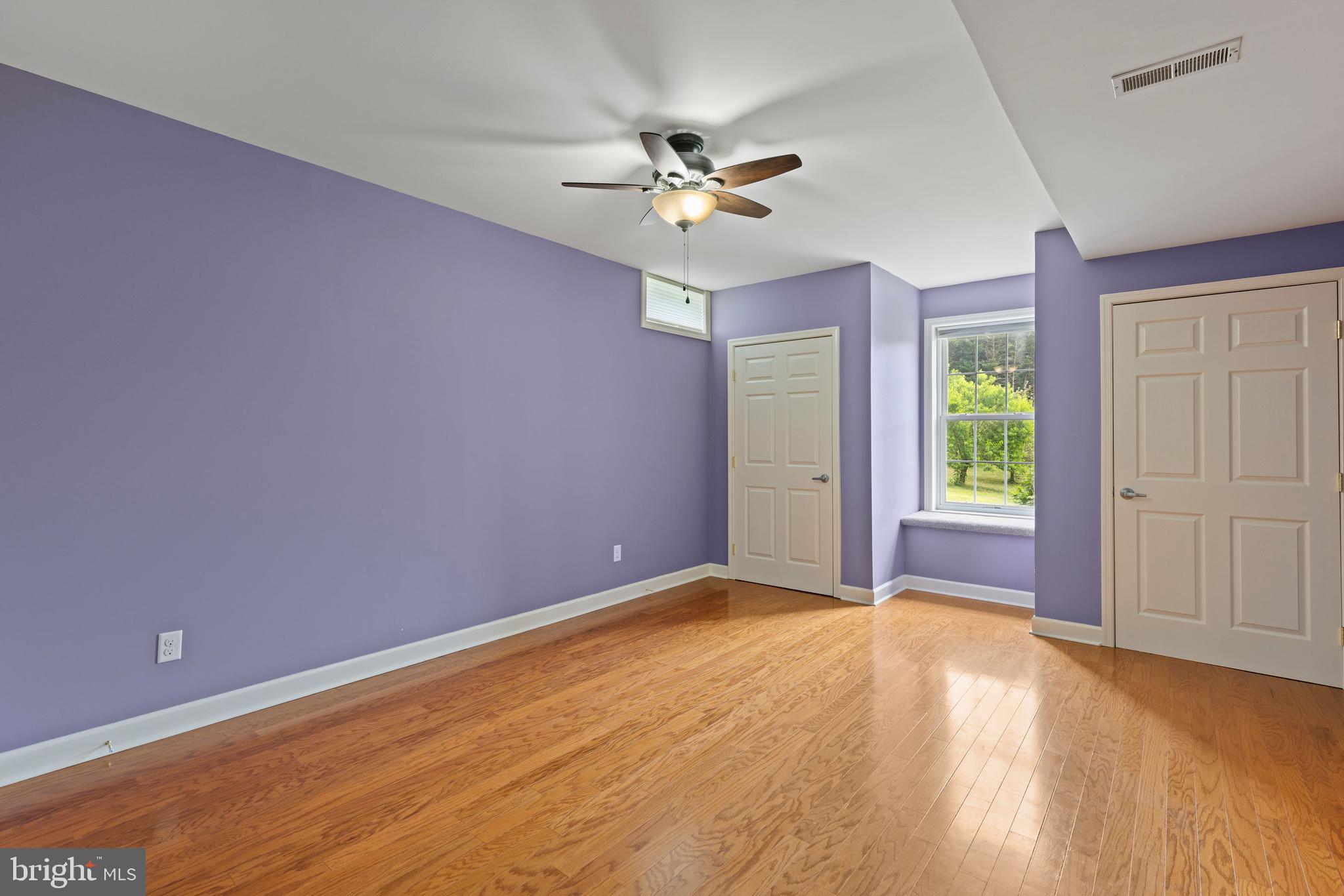 67 Merry Knoll Court Conowingo, MD 21918 - Photo 34 of 50 a view of a livingroom with a window and a ceiling fan