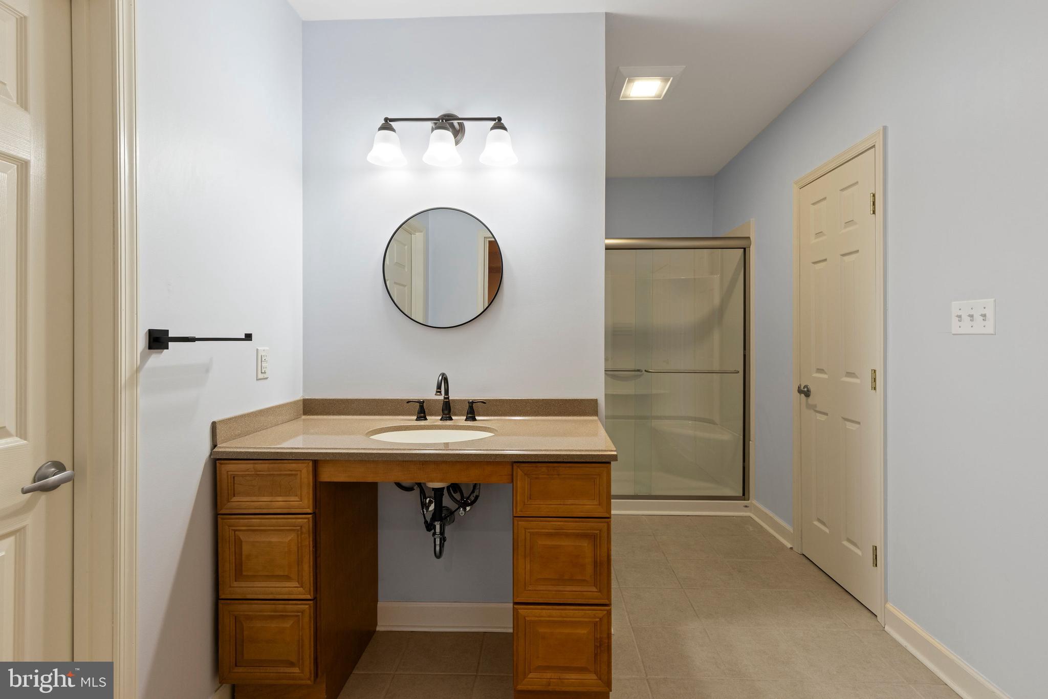 67 Merry Knoll Court Conowingo, MD 21918 - Photo 35 of 50 a bathroom with a sink and a mirror