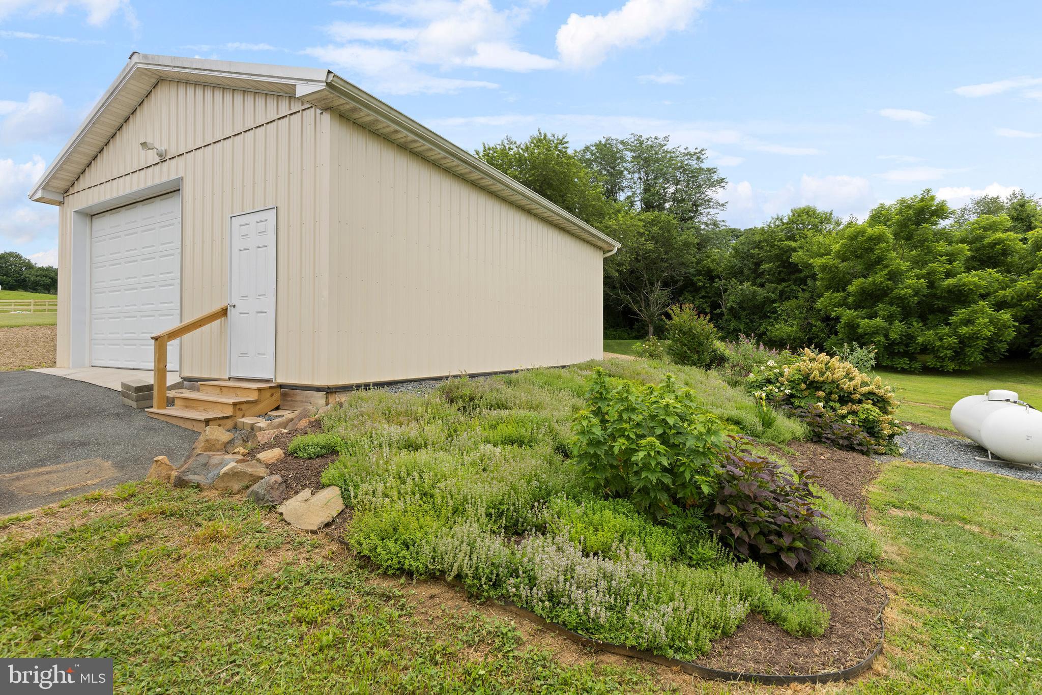 67 Merry Knoll Court Conowingo, MD 21918 - Photo 41 of 50 a view of a house with backyard and garden