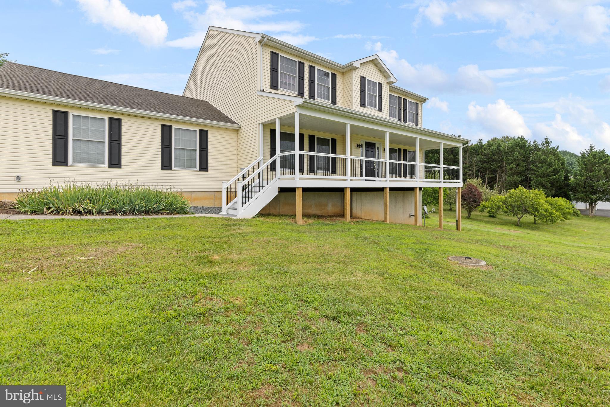 67 Merry Knoll Court Conowingo, MD 21918 - Photo 48 of 50 a large building with a big yard and more windows