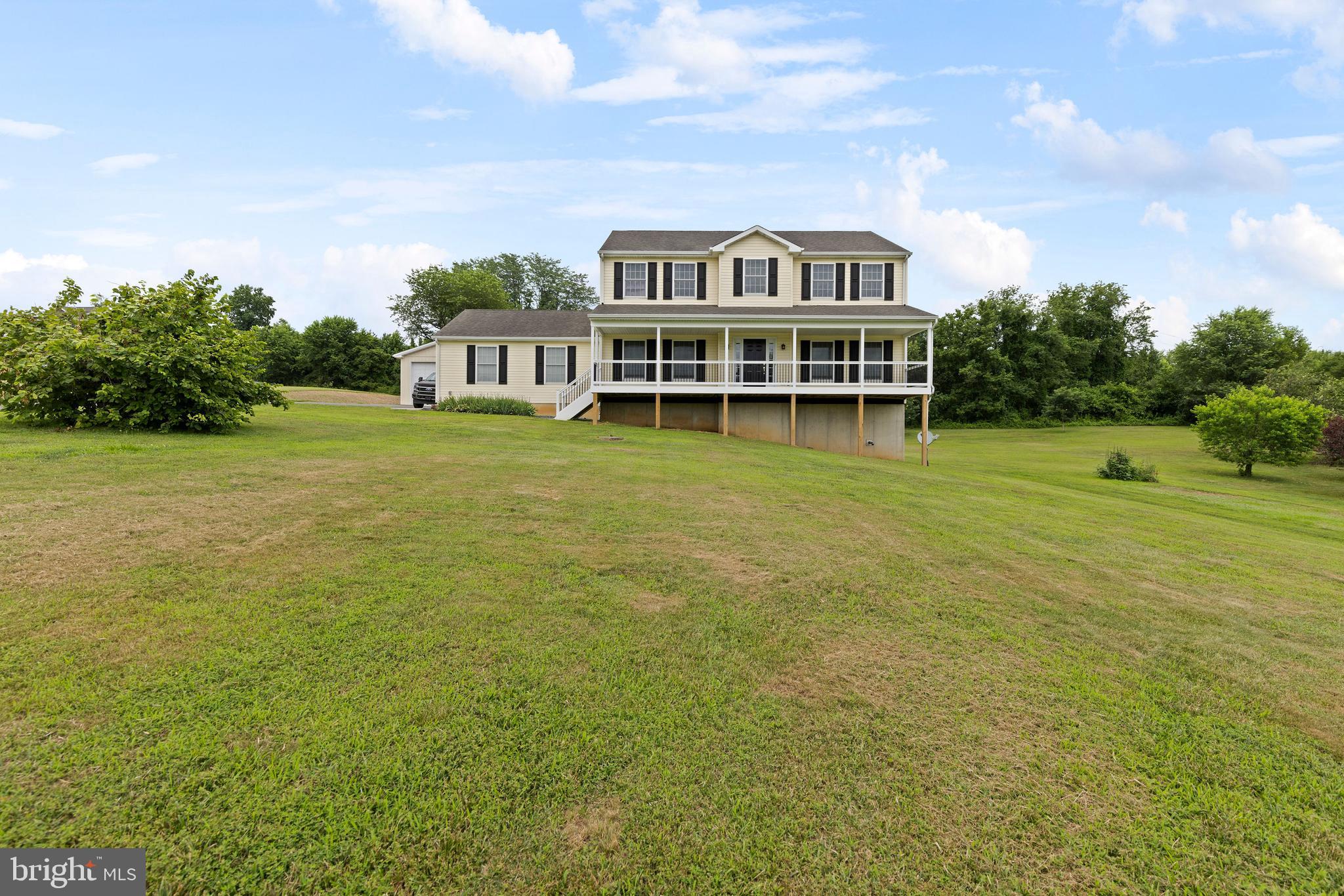 67 Merry Knoll Court Conowingo, MD 21918 - Photo 50 of 50 a view of a big house with a big yard and large trees
