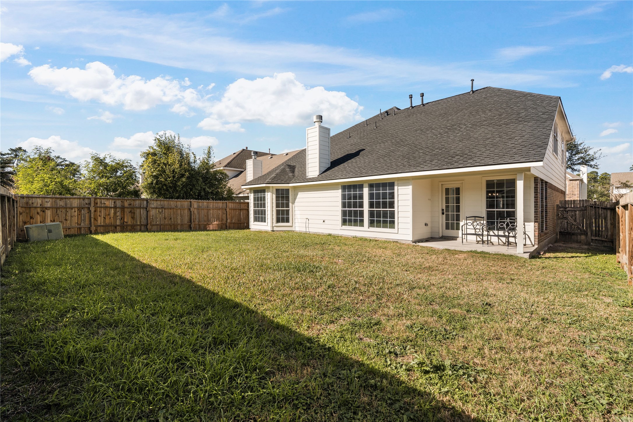 434 Pinewood Ridge Drive Spring, TX 77386 - Photo 30 of 32 a front view of a house with garden