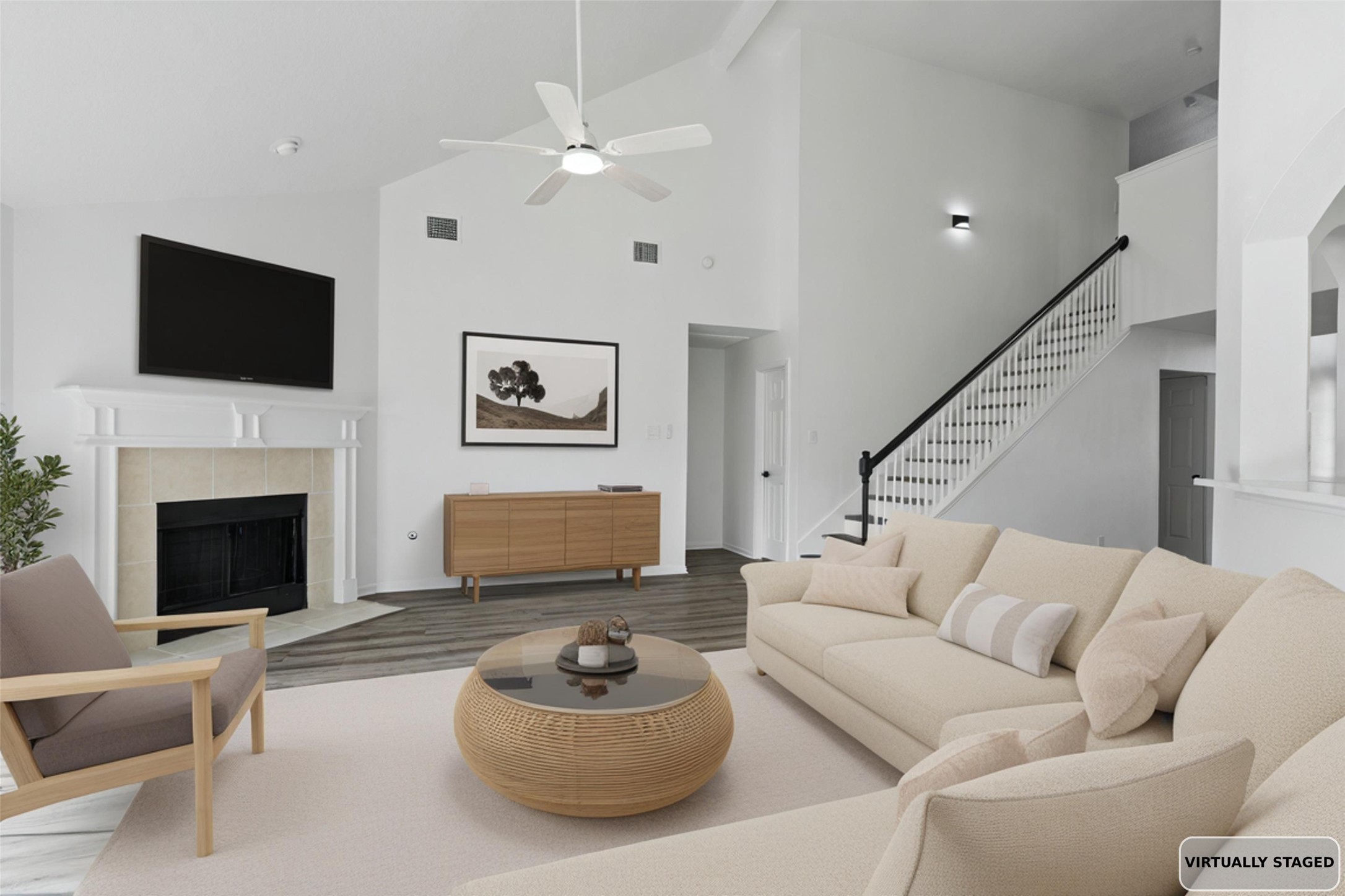 434 Pinewood Ridge Drive Spring, TX 77386 - Photo 5 of 32 a living room with furniture a fireplace and a flat screen tv