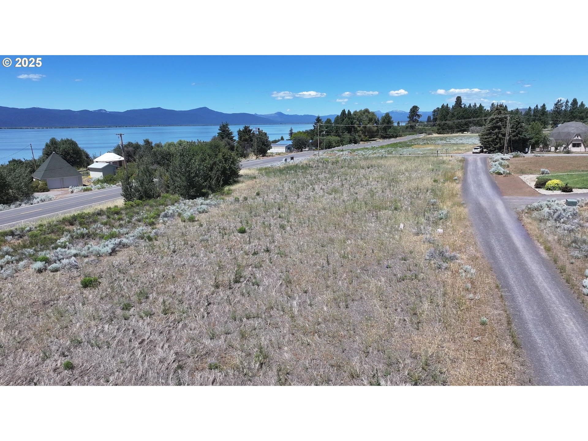 Modoc Point Road, Unit 3 Chiloquin, OR 97624 - Photo 6 of 18 a open area with mountains in the background