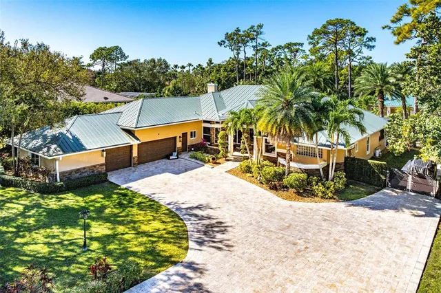 a view of a chairs and table in the patio