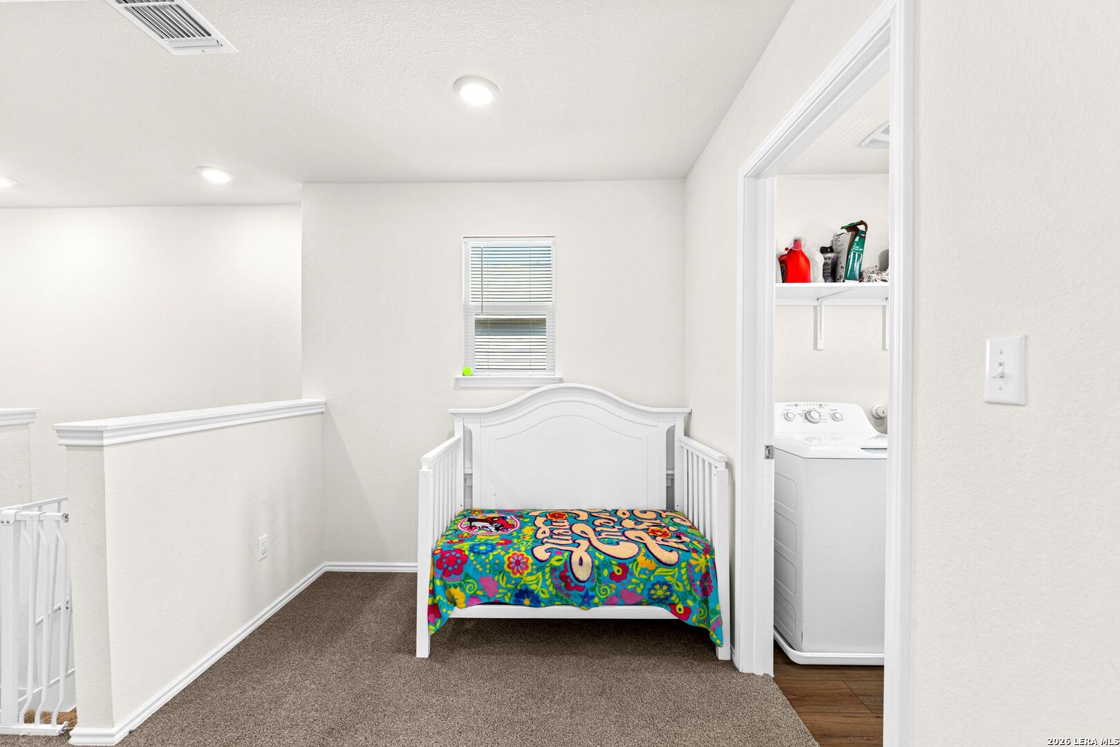 1029 Santiam Street Georgetown, TX 78626 - Photo 18 of 37 a bedroom with a bed and a window