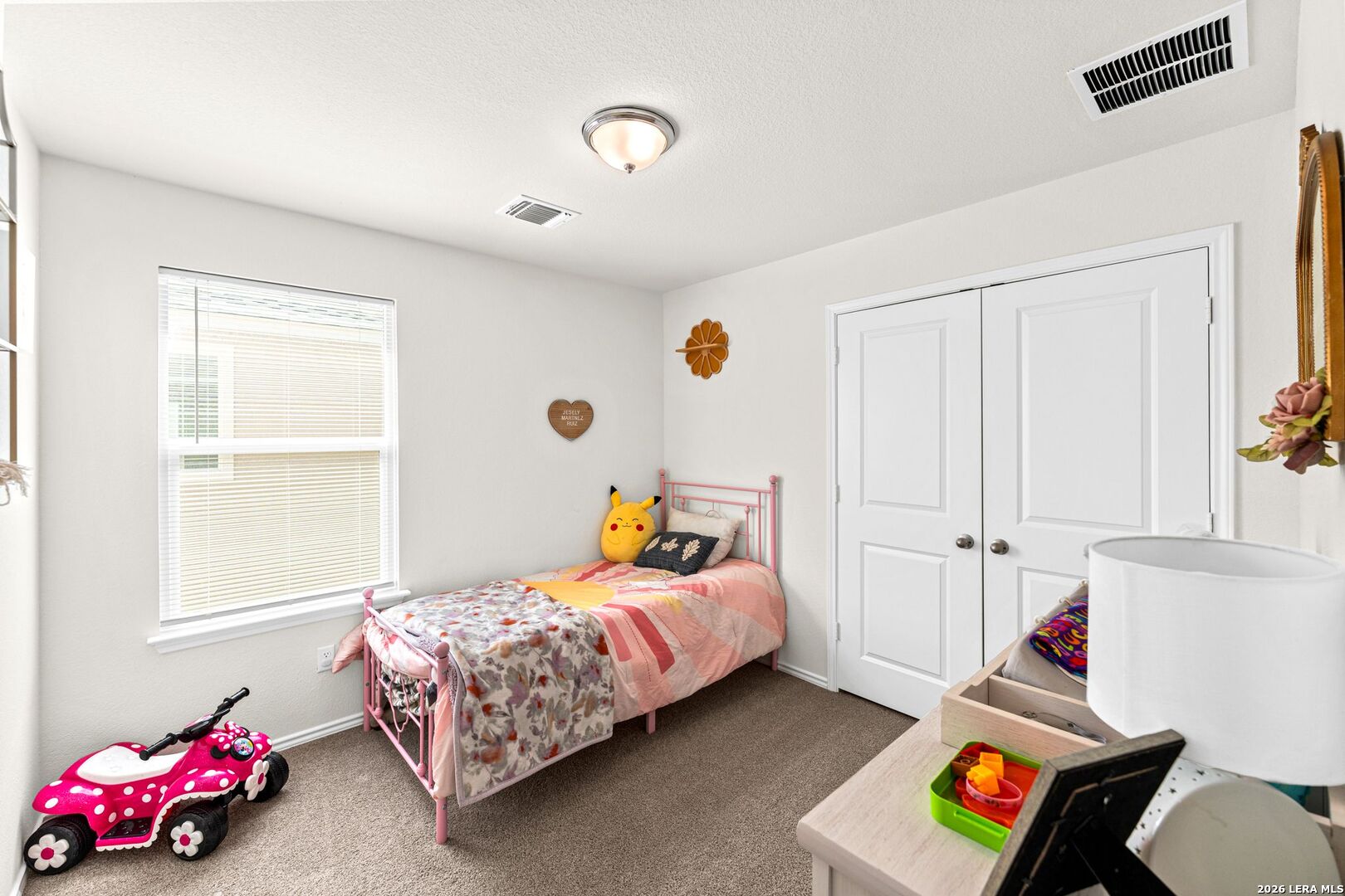 1029 Santiam Street Georgetown, TX 78626 - Photo 23 of 37 a bedroom with bed and a window